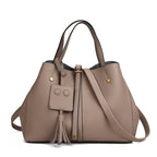 Tassel bucket bag in khaki PU leather