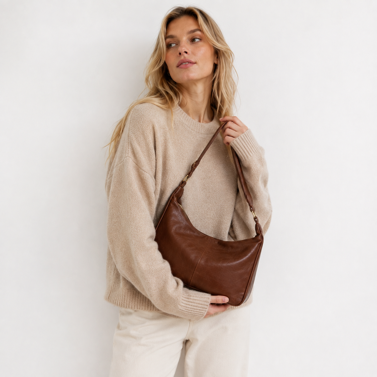 Slouch shoulder bag worn over the shoulder