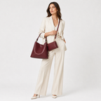 Two-piece tote set carried by the handle
